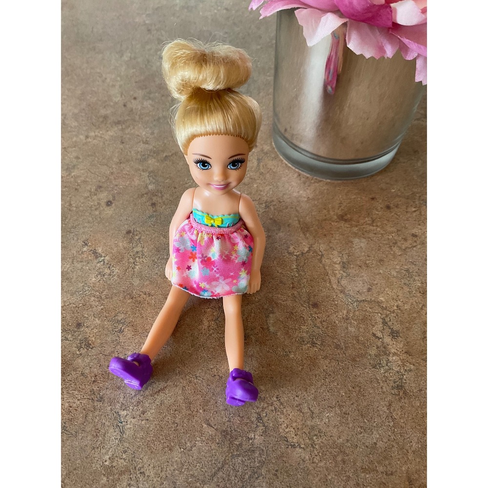 Mattel Barbie Chelsea Doll Blonde Hair Blue Eyes Floral Skirt Purple Shoes 2010
